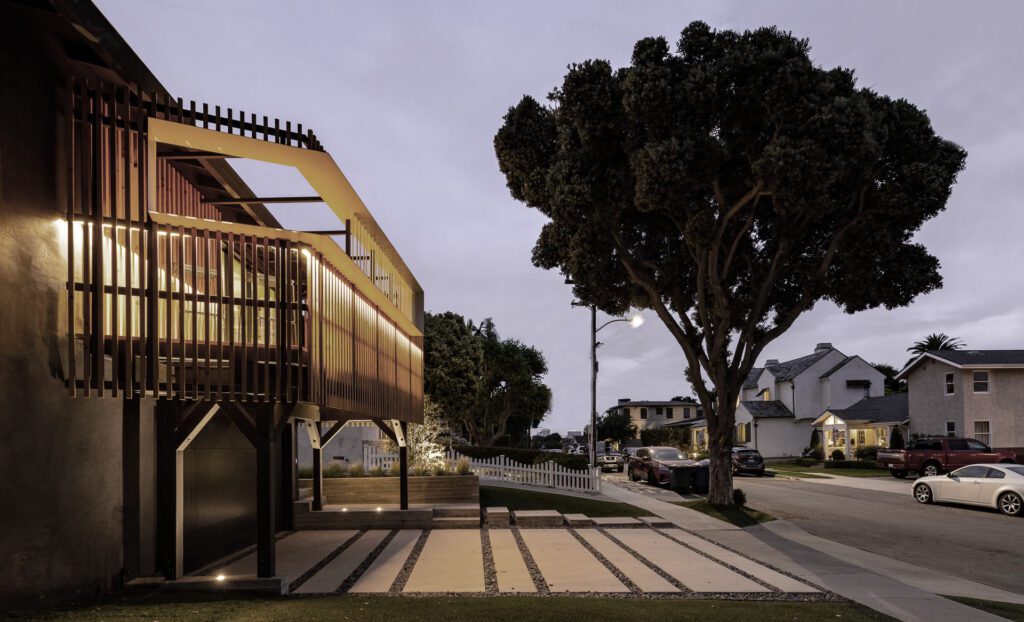 alloi-architecture-seaside-home-neutral-front patio-front facade-new facade-wood screen-home addition-landscape design-hardscape design-front yard design-el segundo-beach house